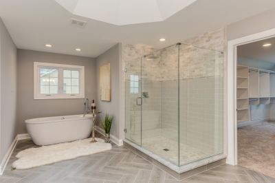 Glass-Enclosed Shower with Minimal Frame